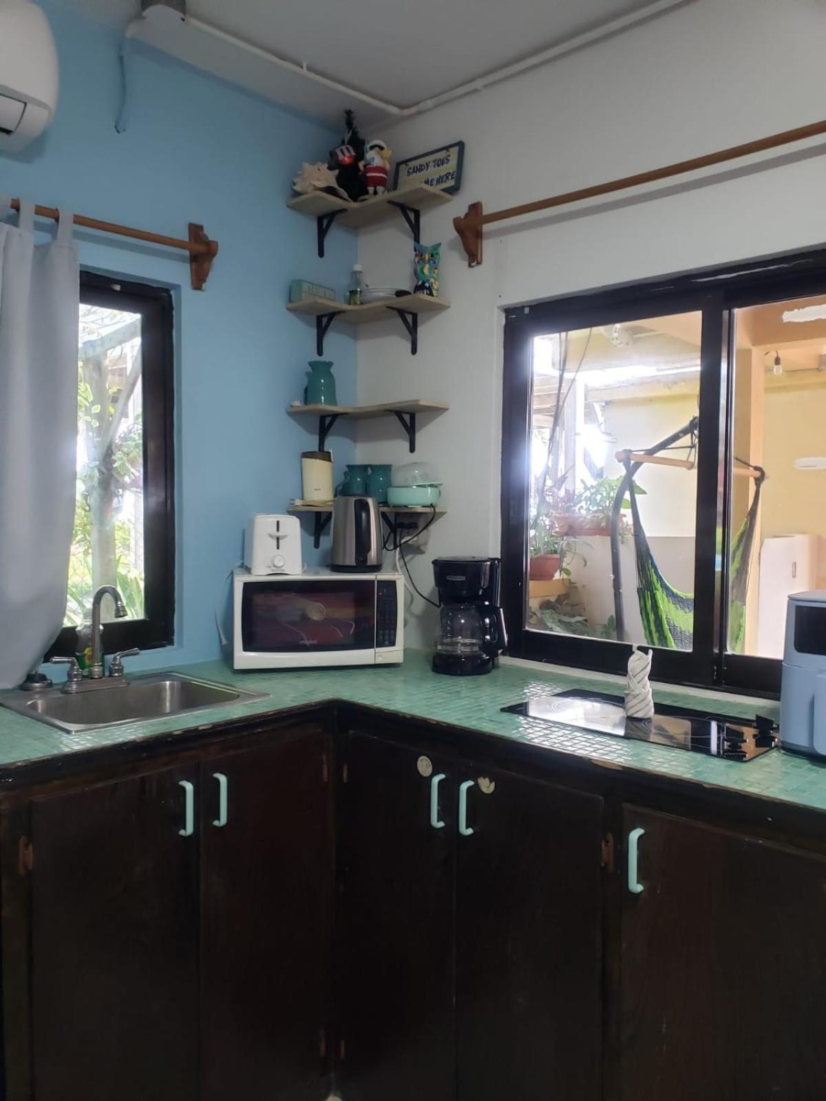 Beach Club Condos At Popeyes Caye Caulker Bagian luar foto